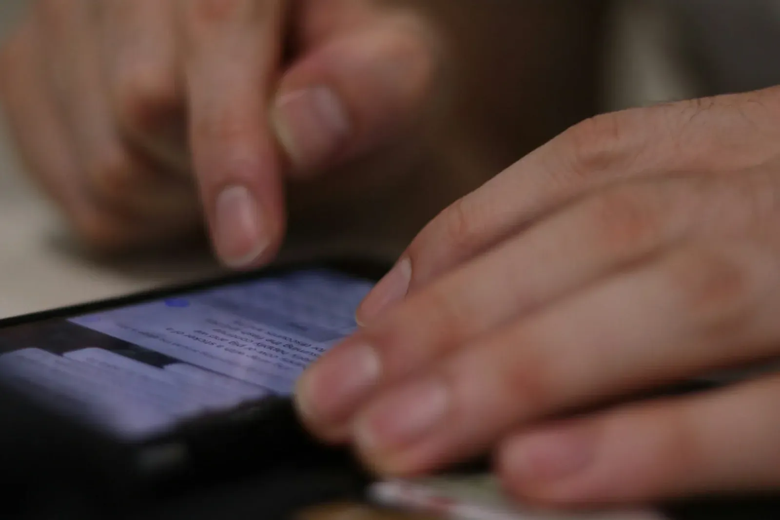A smartphone screen showing encrypted message bubbles, representing private and secure communication alternatives